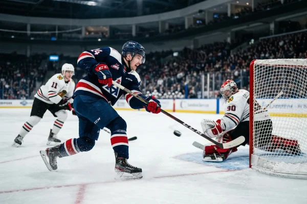 Tiro de jugador de hockey NHL hacia portería en situación de gol