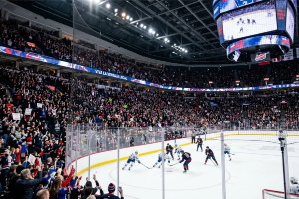 Estadio de hockey NHL lleno de aficionados locales animando a su equipo